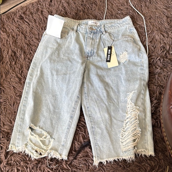 Brand new denim distressed jorts so
Cool - Picture 1 of 6